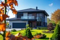 Modern two-storey house with a flat lawn in the yard Royalty Free Stock Photo