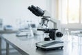 Modern unbranded microscope in a bright clean laboratory setting Royalty Free Stock Photo