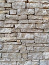 Modern uneven bricks made of stone and rock making an interesting wall for indoors and outdoors