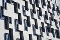 Modern and unusual architecture. Non-standard forms and decisions. Lines and geometry of the big building in black-and-white tones