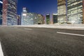 The modern urban commercial building and asphalt road Royalty Free Stock Photo