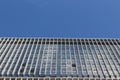 modern urban multi-storey building, on the background of blue sky, background Royalty Free Stock Photo