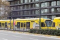 Modern urban yellow tram SAHIBINDEN on the roads of Istanbul, Turkey