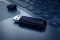 Modern USB Flash drive on laptop keyboard Royalty Free Stock Photo