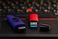 Modern usb flash drives on laptop, closeup Royalty Free Stock Photo