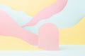 Modern vapor wave style stage mockup with pink round niche podium, pastel mountain landscape - pink, yellow, mint color. Template.