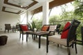 Modern veranda in Asia with outdoor seats and tables
