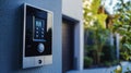 Modern video intercom system with camera installed at home entrance outdoor setting close-up perspective security concept