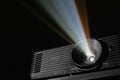 Modern video projector on dark background, closeup Royalty Free Stock Photo