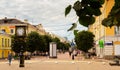 Trekhsvyatskaya pedestrian street with main clock in Tver in summer , Russia Royalty Free Stock Photo