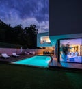 Modern villa with colored led lights at night Royalty Free Stock Photo