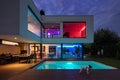 Modern villa with colored led lights at night Royalty Free Stock Photo