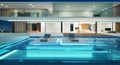 Modern villa with a swimming pool at night Royalty Free Stock Photo