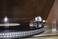 Modern vinyl record player with disc on black background, closeup Royalty Free Stock Photo