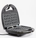 Modern waffle maker machine Royalty Free Stock Photo