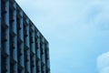 Modern wall with windows of city resident in abstract view