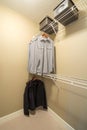 Modern wardrobe closet with clothes