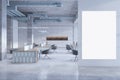 Modern warehouse office interior with empty white mock up banner, furniture, concrete flooring and columns. Royalty Free Stock Photo