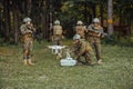 Modern Warfare Soldiers Squad are Using Drone for Scouting and Surveillance During Military Operation in the Forest.