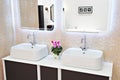 Modern washbasin, faucets in bathroom Royalty Free Stock Photo