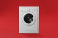 Modern washing machine on background. Laundry day Royalty Free Stock Photo