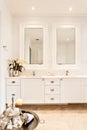 Modern washroom with two mirrors in a luxury house