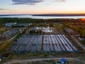 Modern wastewater treatment plant, tanks for biological purification of sewage, aerial view at the evening sunset Royalty Free Stock Photo