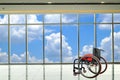 Modern wheelchair parked in empty room Royalty Free Stock Photo