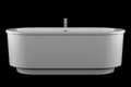 Modern white bathtub isolated on black