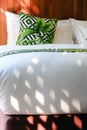 Modern white bed and pillow in the morning mood Royalty Free Stock Photo