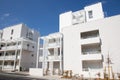 Modern white building with balcony on a blue sky Royalty Free Stock Photo