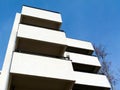 modern white building exterior facade detail in strong diminishing perspective Royalty Free Stock Photo