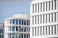 modern white building exterior symetric windows in a row modern architecture