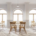 Modern white cafe, wooden chairs Royalty Free Stock Photo