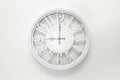 Circle clock on white background wall