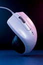 Modern white computer mouse with scroll wheel and cable Royalty Free Stock Photo