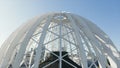 Modern white dome-shaped structure. Stock footage. Top view of beautiful domed structure in modern city. Beautiful domed Royalty Free Stock Photo
