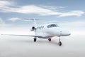 Modern white executive jetliner isolated on bright background with sky