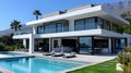 Modern white house with a swimming pool and a mountain in the background Royalty Free Stock Photo