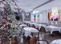 Modern white interior with bright details and New Year decorations in a Moscow restaurant