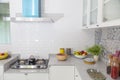 Modern white kitchen with counter and white details, minimalist interior