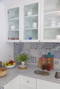 Modern white kitchen with counter and white details, minimalist interior