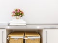 Modern white laundry room with two baskets