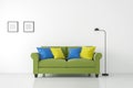 Modern white living room interior with colorful sofa 3d rendering Image Royalty Free Stock Photo