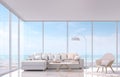 Modern white living room with sea view 3d rendering image.There are large window overlooks to sea view. Royalty Free Stock Photo