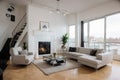 Modern white loft apartment interior, living room, hall, staircase, fireplace panorama ing Royalty Free Stock Photo