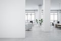 Modern white loft coworking office interior with blank mock up place on wall, panoramic windows, furniture, equipment and no Royalty Free Stock Photo