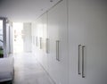 Modern white long corridor closet, contemporary Royalty Free Stock Photo