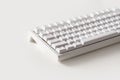 Modern white mechanical keyboard. Minimal style and design keyboard. Custom build keyboard.