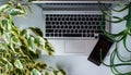 Modern white office desk table with laptop, cup of coffee. Royalty Free Stock Photo